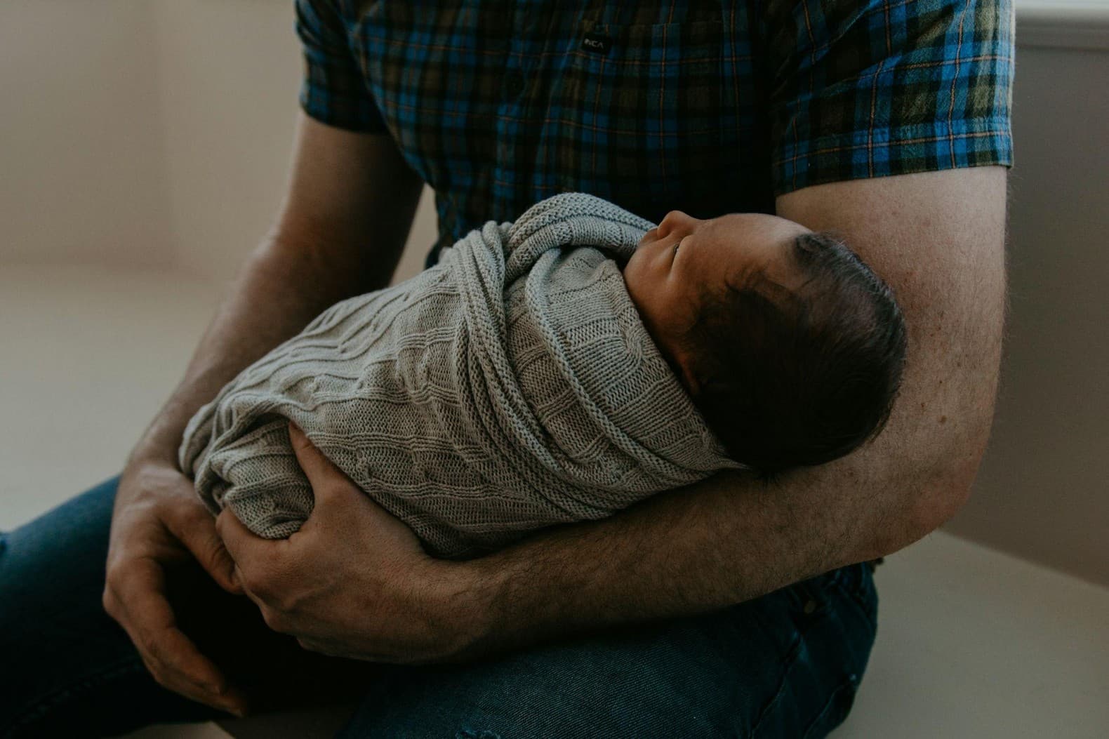A parent caring for a baby